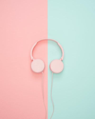 pink-corded-headphones-on-pink-and-teal-wall-1037996